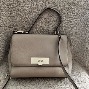 Sold…..Michael Kors beige shoulder and hand bag
